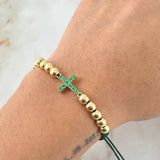 Pulsera Verde Herraje Cruz 2.3gr / 5mm Bolas Lisas 10und Esmeralda 33pts Oro Amarillo 18K ©