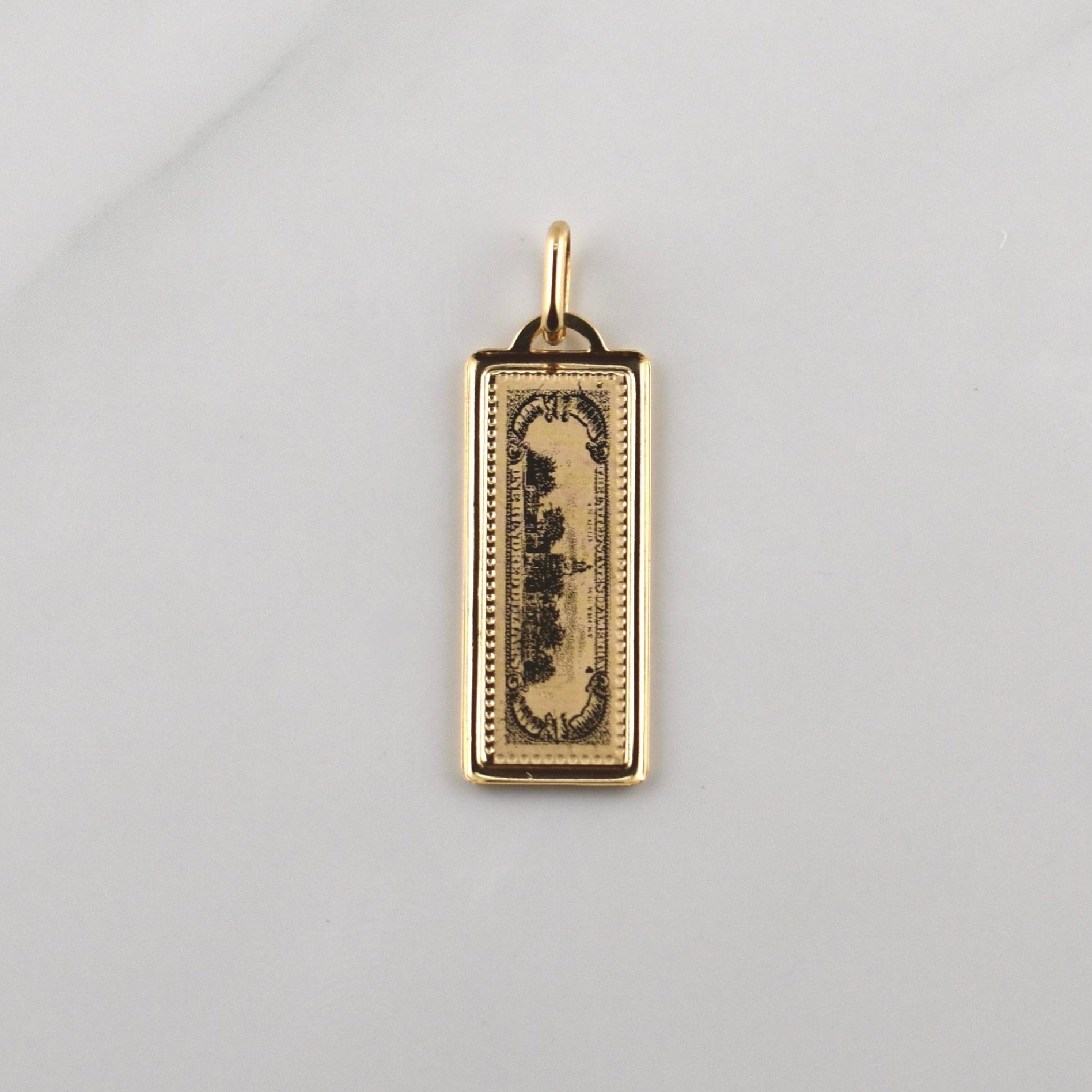 Dije 100 Dolares 1.1gr / 3cm / Oro Amarillo +4 18K