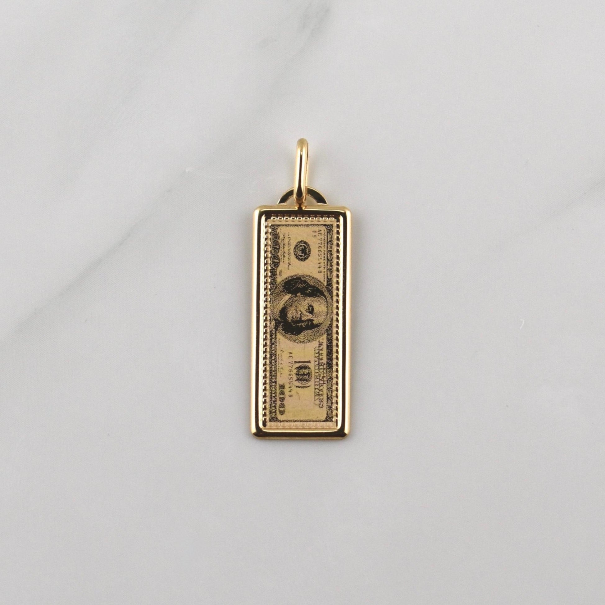 Dije 100 Dolares 1.1gr / 3cm / Oro Amarillo +4 18K