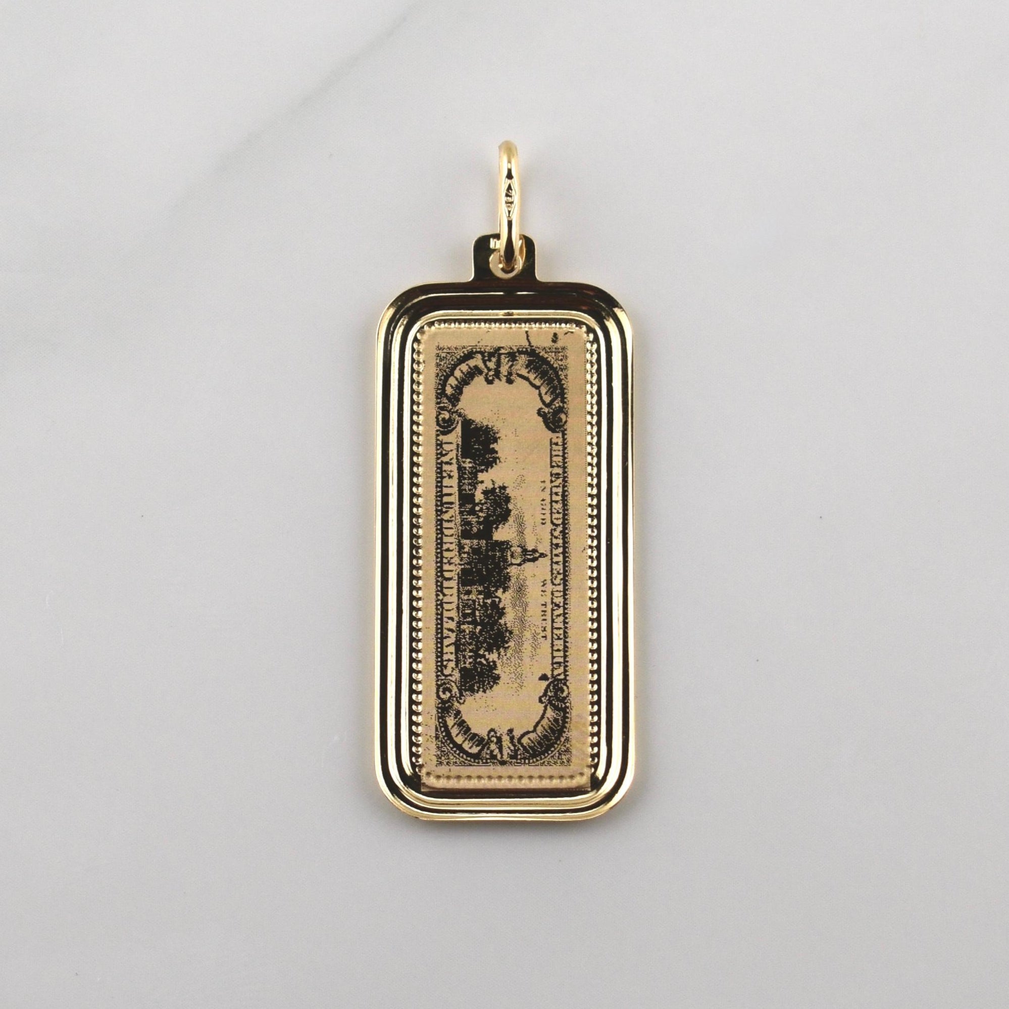 Dije 100 Dolares 2.3gr / 4cm / Oro Amarillo +4 18K