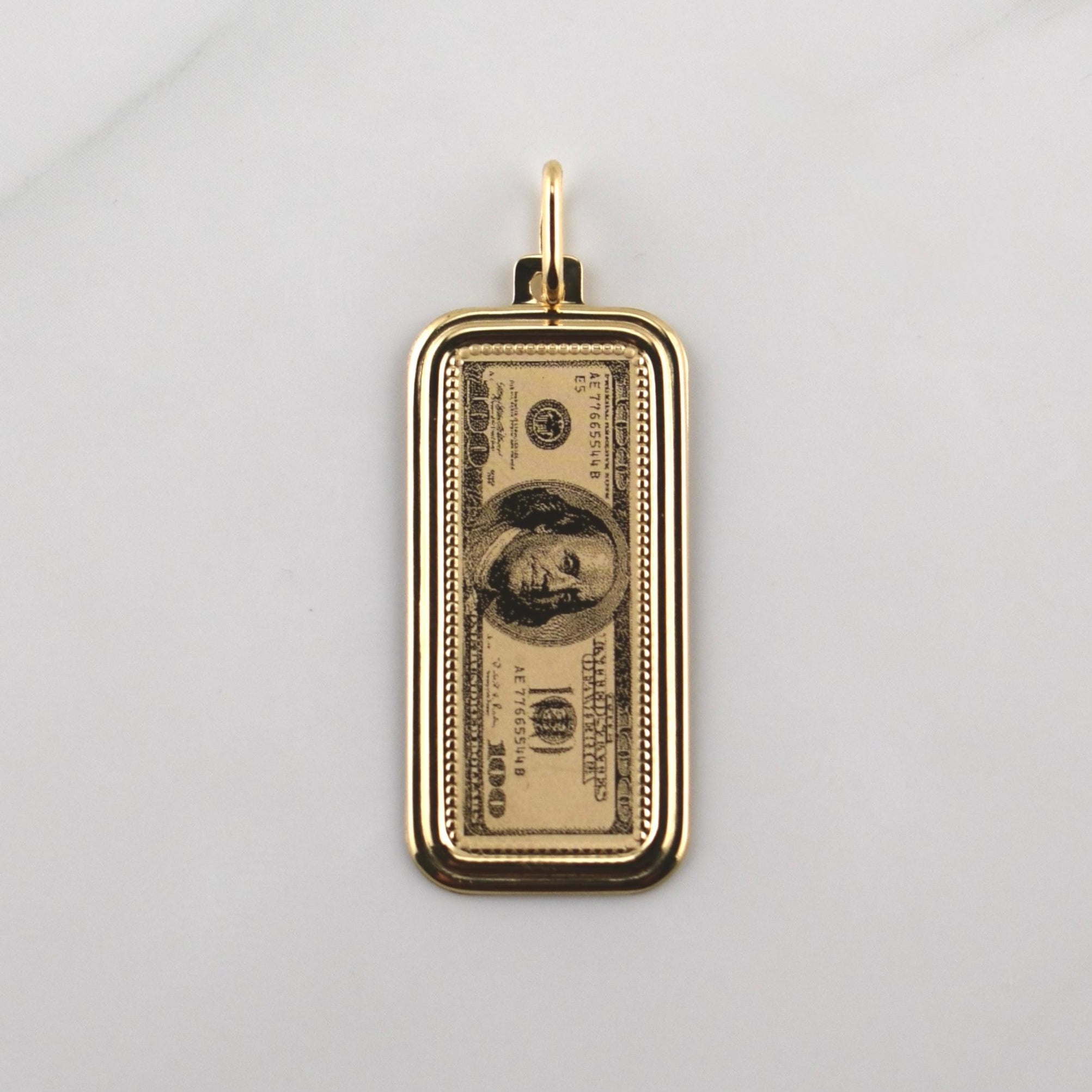 Dije 100 Dolares 2.3gr / 4cm / Oro Amarillo +4 18K