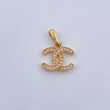 Dije Ola Cruzada 1.3gr / 2cm / Oro 18K &