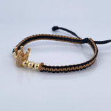 Pulsera Tejida Negra Beige Corona 2.15gr / Oro 18K $