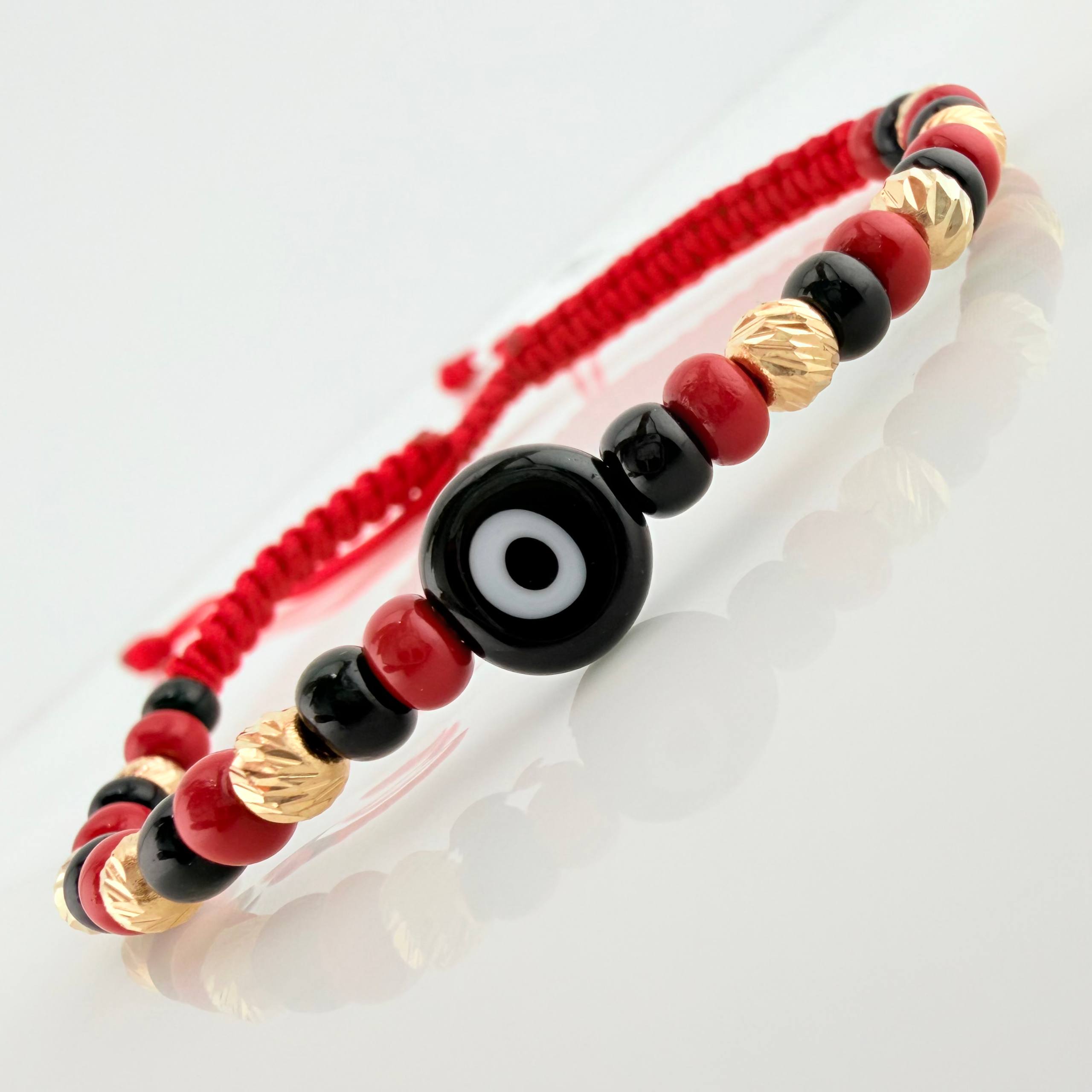 Pulsera Tejida Roja Ojo Turco Oro Amarillo 18K