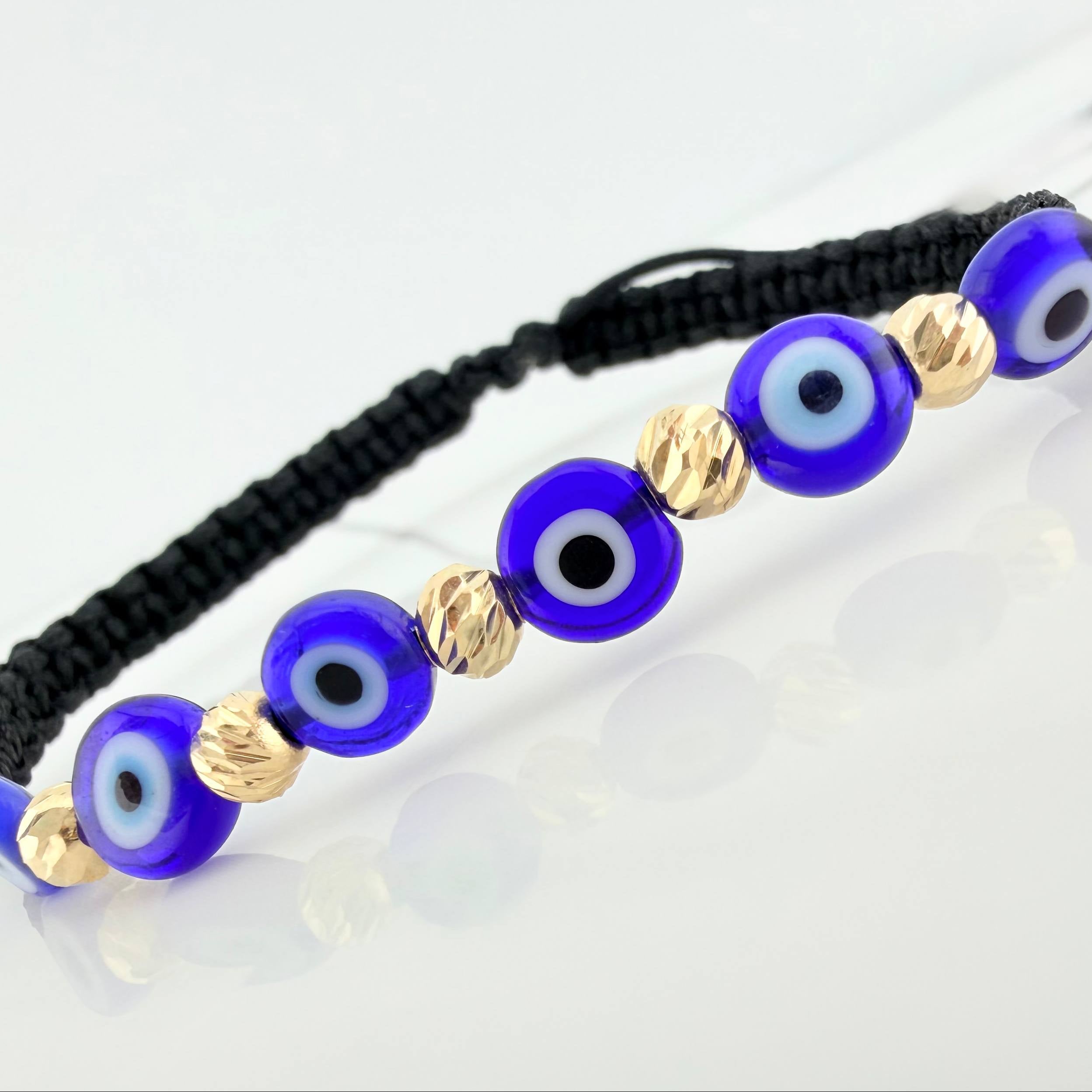 Pulsera Tejida Negra Ojos Turcos Azules Oro Amarillo 18K