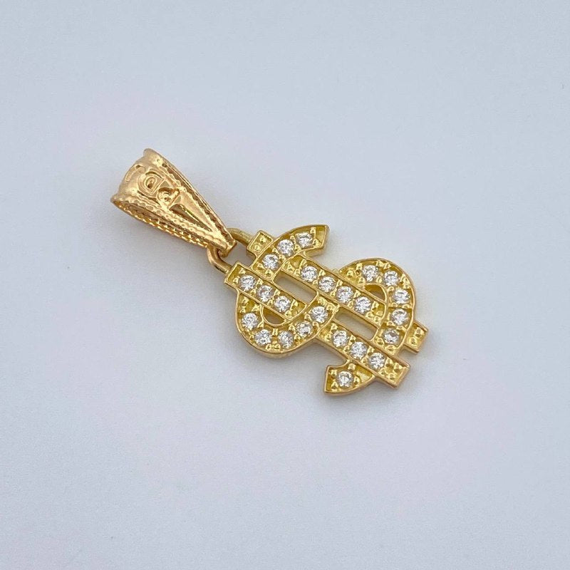 Dije Signo Dólar 0.7gr / 1.8cm / Oro Amarillo 18K &