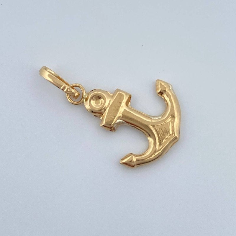 Dije Ancla 0.7gr / 2.5cm / Oro Amarillo 18K &
