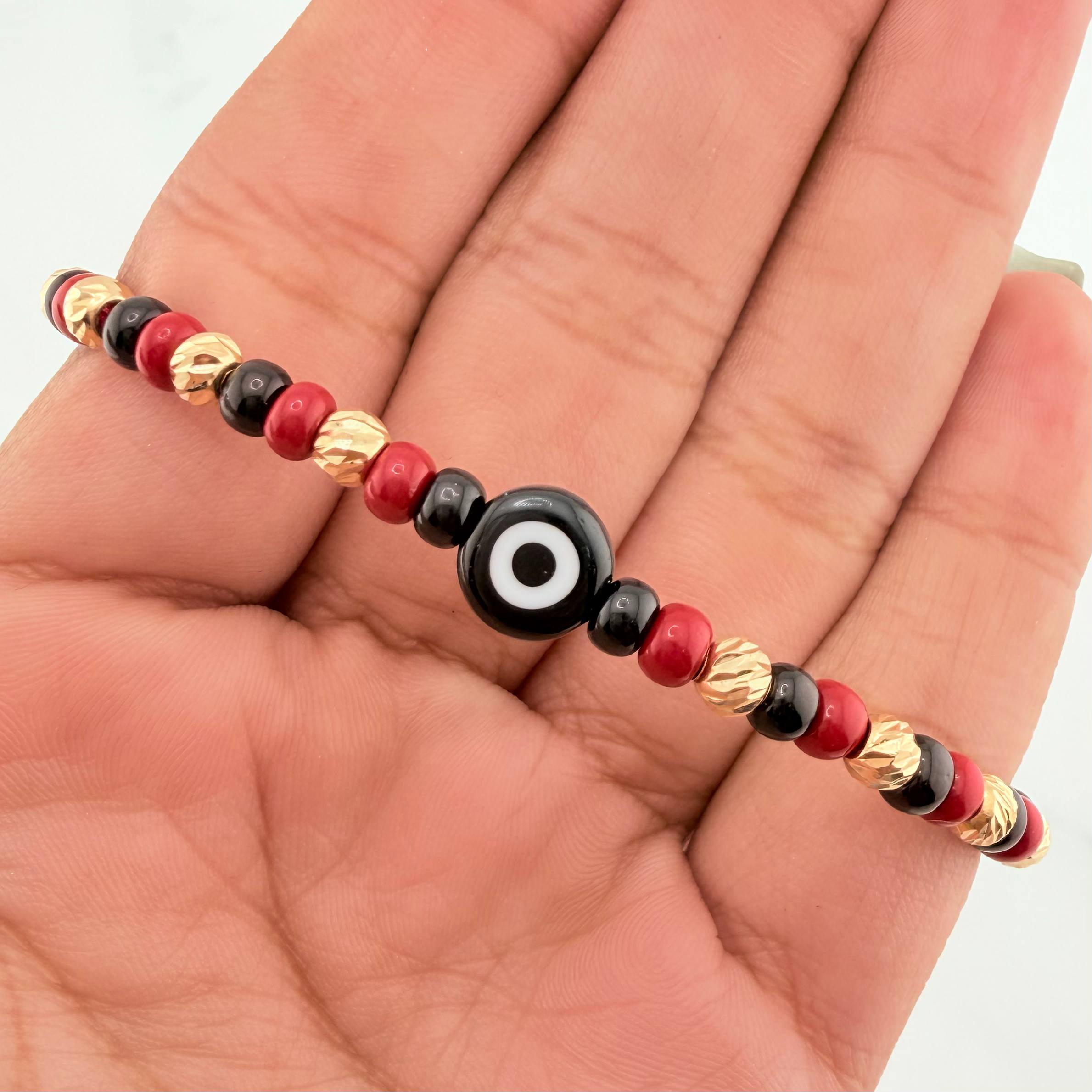 Pulsera Tejida Roja Ojo Turco Oro Amarillo 18K