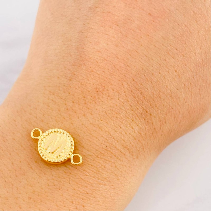 Herraje Circulo Letra M 0.55g / 1.7cm Oro Amarillo 18K