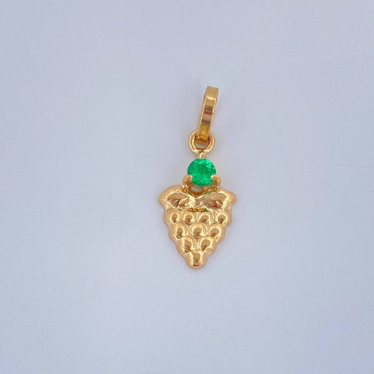 Dije Figura Uvas 0.4gr / 1.6cm / Oro Amarillo 18K $
