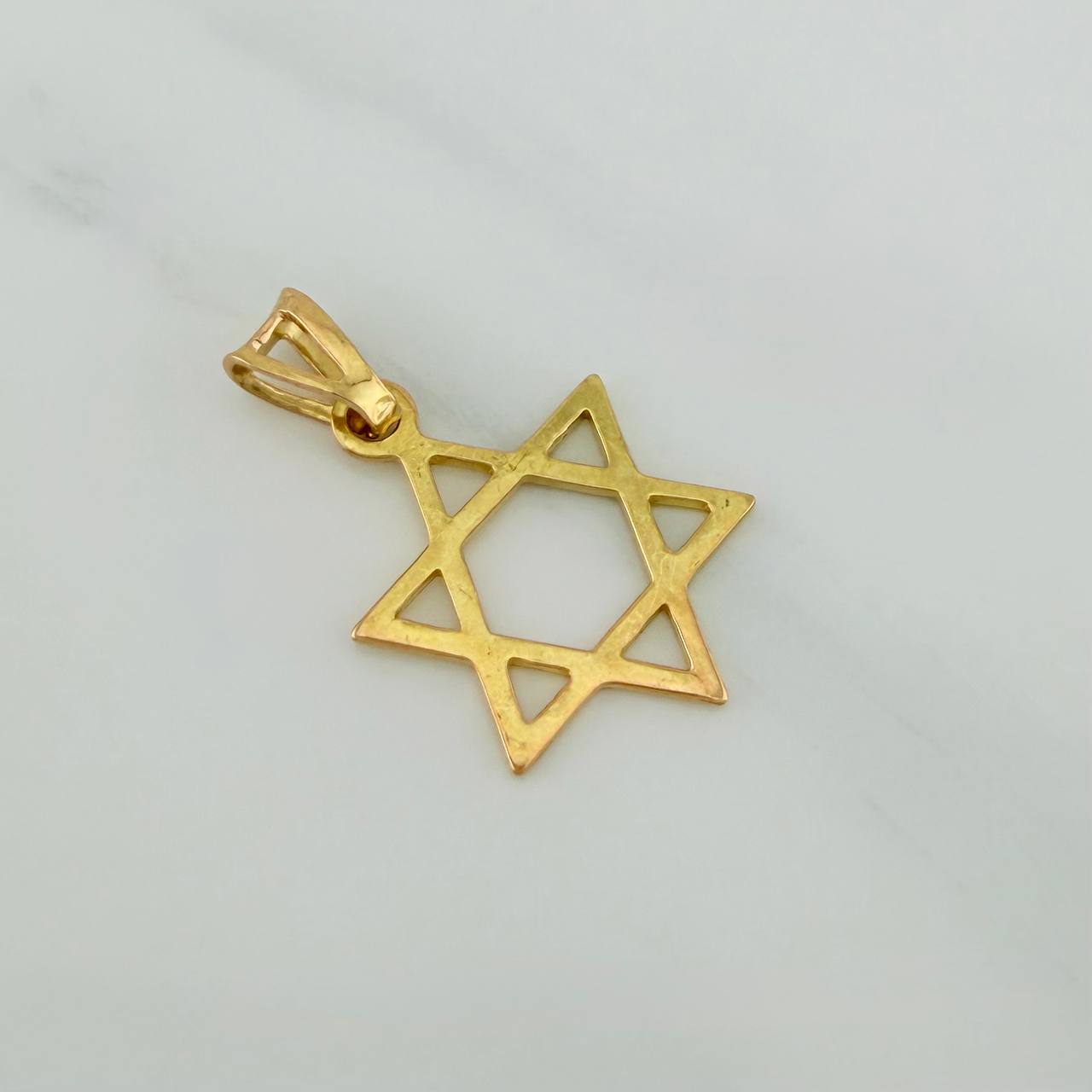 Dije Silueta Estrella 1.3gr / 2.4cm / Oro Amarillo 18K %