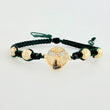Pulsera Tejida Verde y Negra Herraje de San Miguel Arcángel Bolas Diamantadas Dos Oros Amarillo Blanco 18K