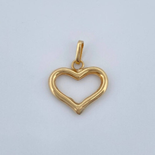 Dije Corazon Silueta 0.5gr / 1.6cm / Oro Amarillo 18K &