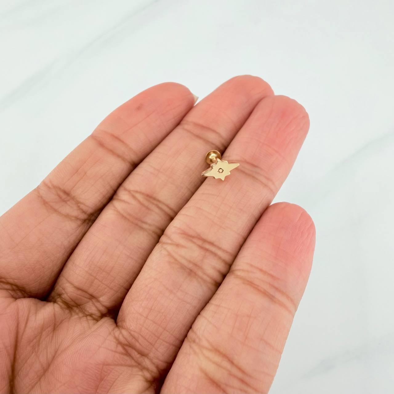 Piercing Estrella Cardenal 0.55 g / 0.9 cm Oro Amarillo 18K