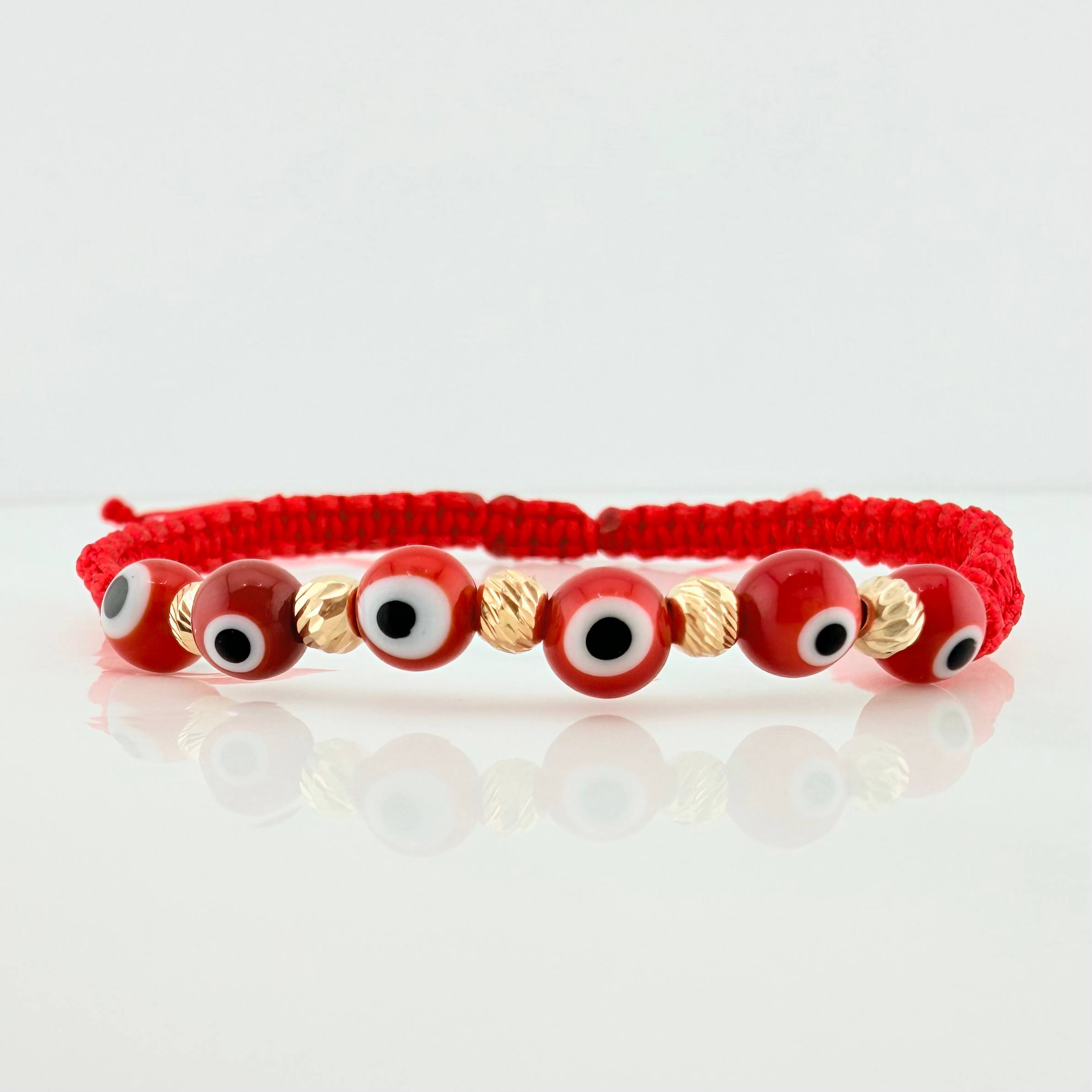 Pulsera Tejida Roja Ojos Turcos Oro Amarillo 18K