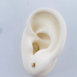 Topos Flor Diamante 0.7gr / Oro Amarillo 18K %