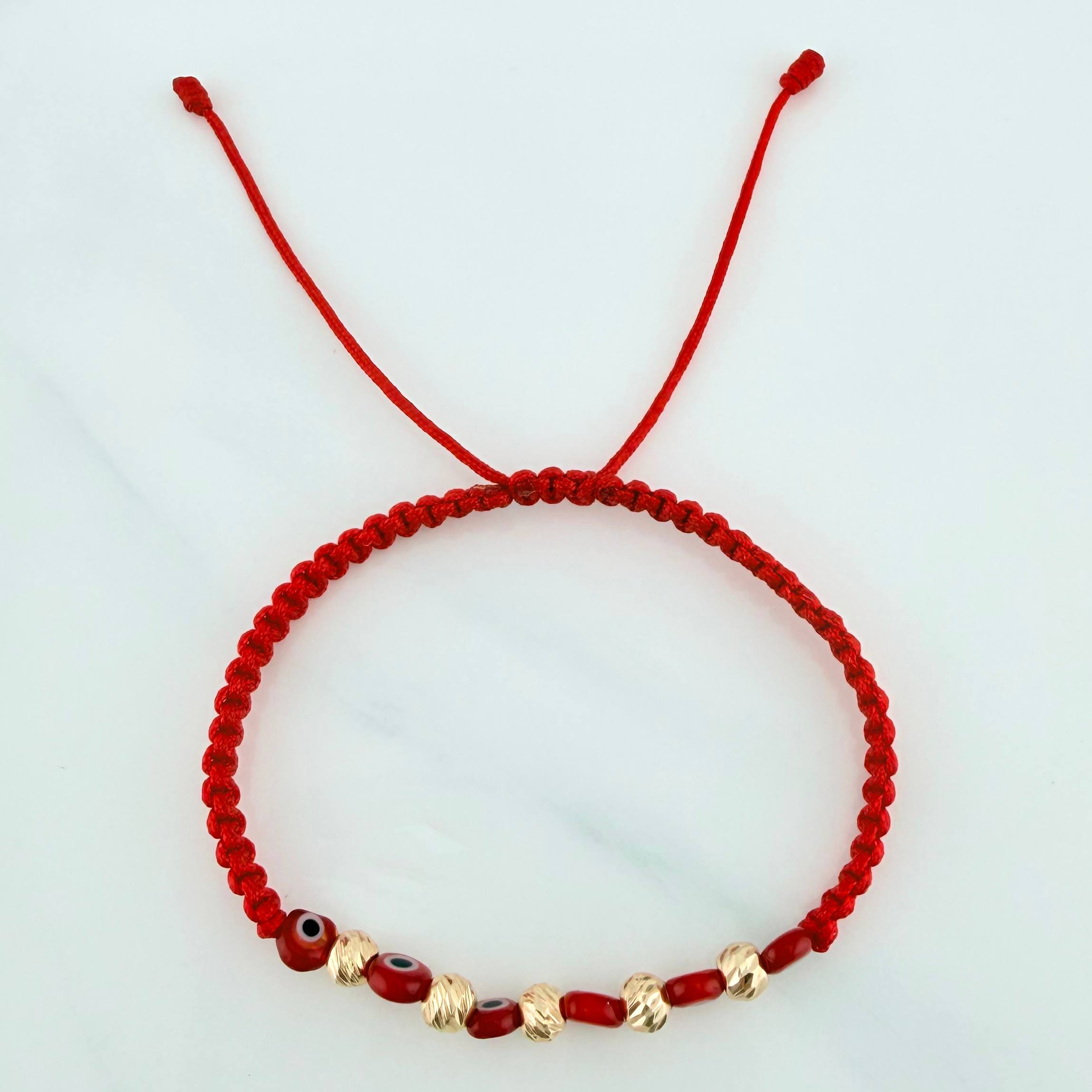 Pulsera Tejida Roja Ojos Turcos Oro Amarillo 18K