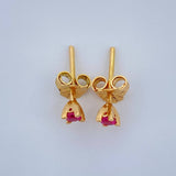Topos Cuatro Garras Ruby 0.85gr / Oro Amarillo 18K %
