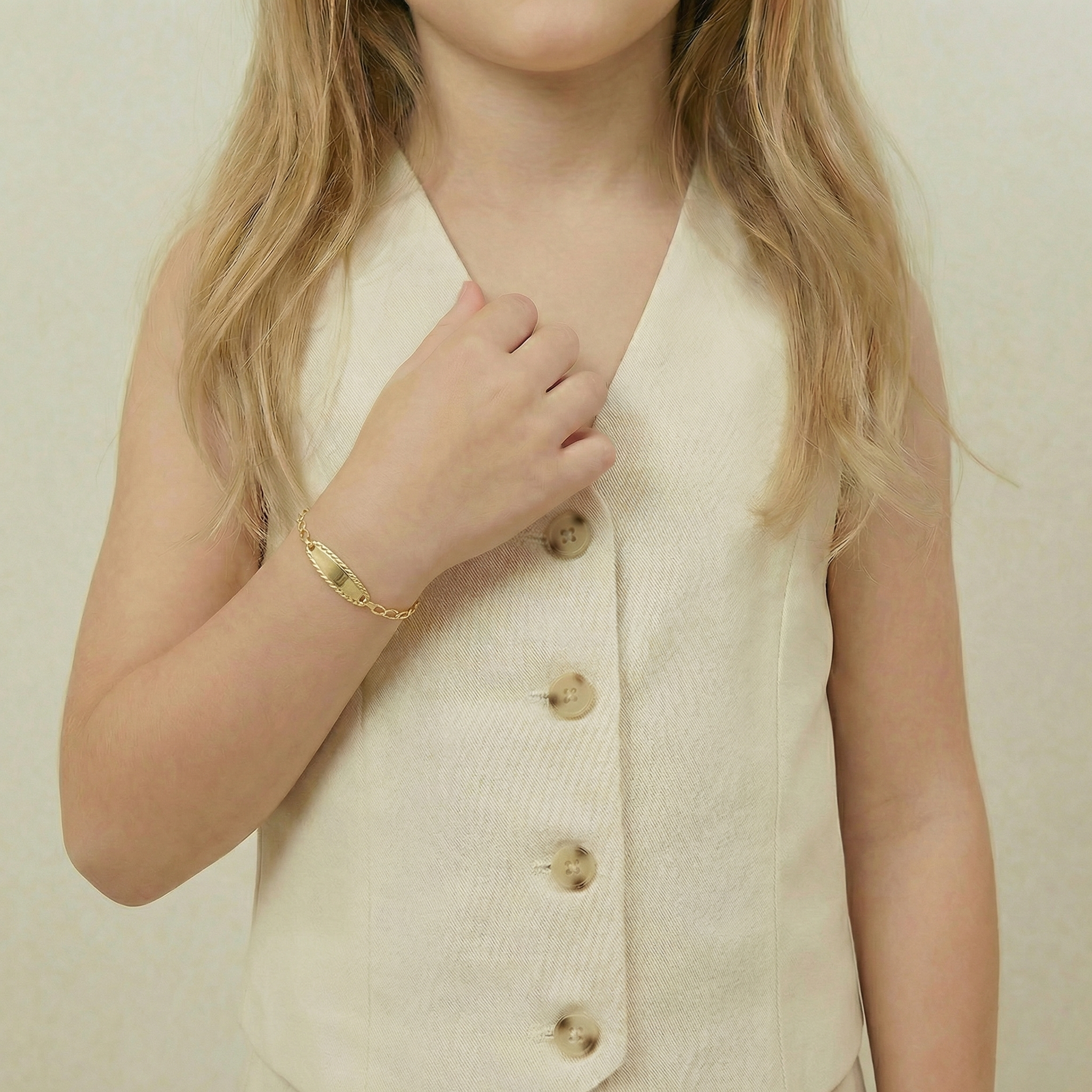 Pulso Bebé Espiga Placa Ovalada  Bordeada 1.2gr / 14.5cm / 2.7mm Oro Amarillo 18K ©