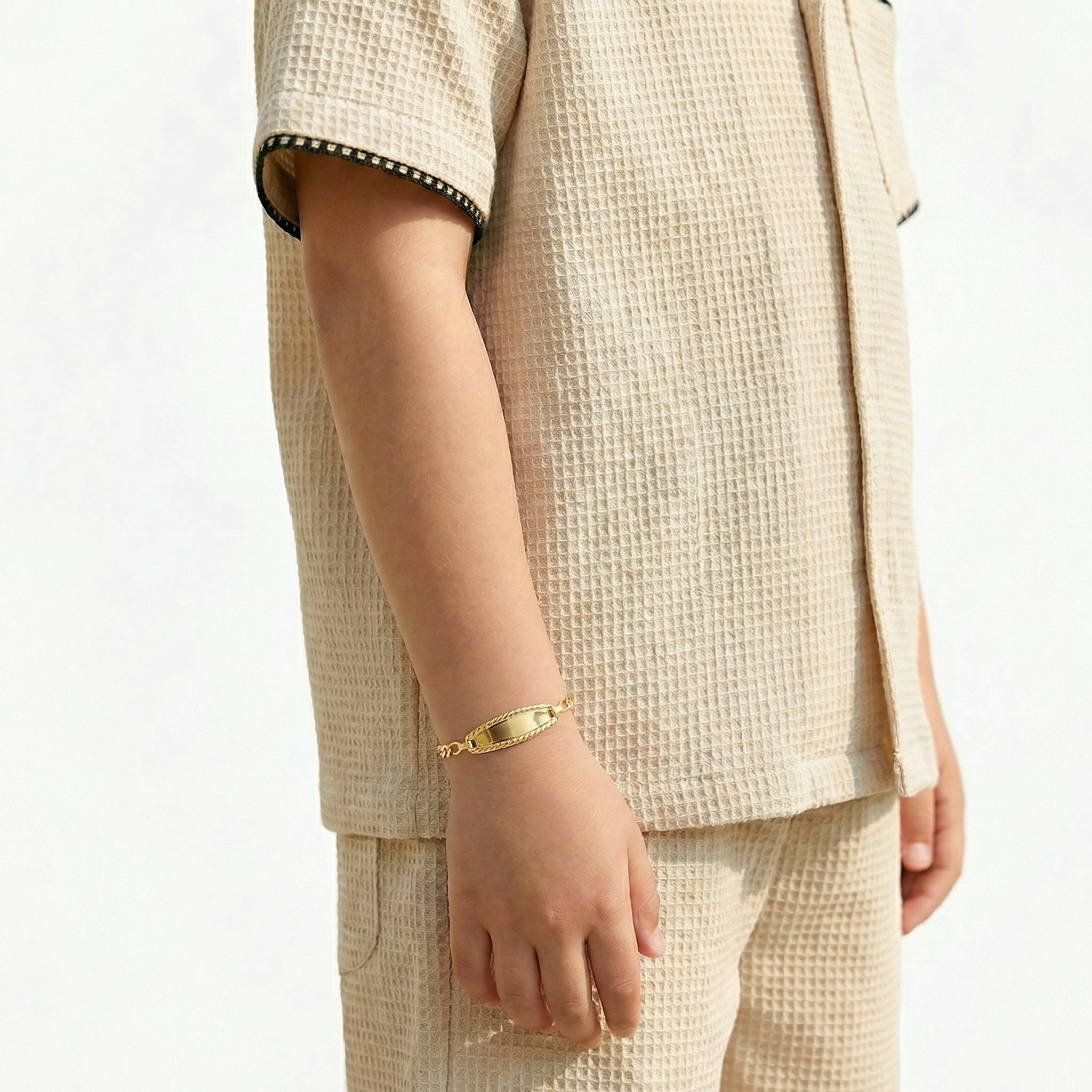 Pulso Bebé Espiga Placa Ovalada  Bordeada 1.2gr / 14.5cm / 2.7mm Oro Amarillo 18K ©