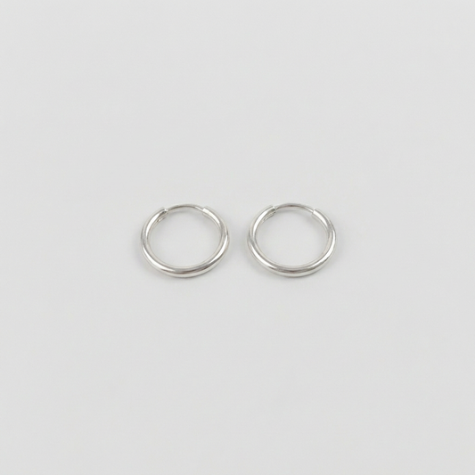 Candongas Mini Aro Liso 0.35gr / 9mm Oro Blanco 18K