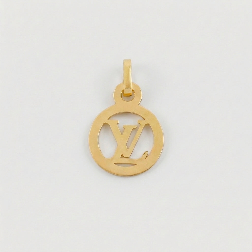 Dije Circulo Letra 0.5 g / 1.9 cm Oro Amarillo 18K
