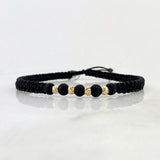 Pulsera Tejida Negra Bolas Diamantadas 3mm Oro Amarillo 18K