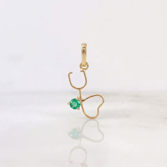 Dije Figura Fonendoscopio Esmeralda 07 pts 0.4gr / 1.8cm / Oro Amarillo 18K %