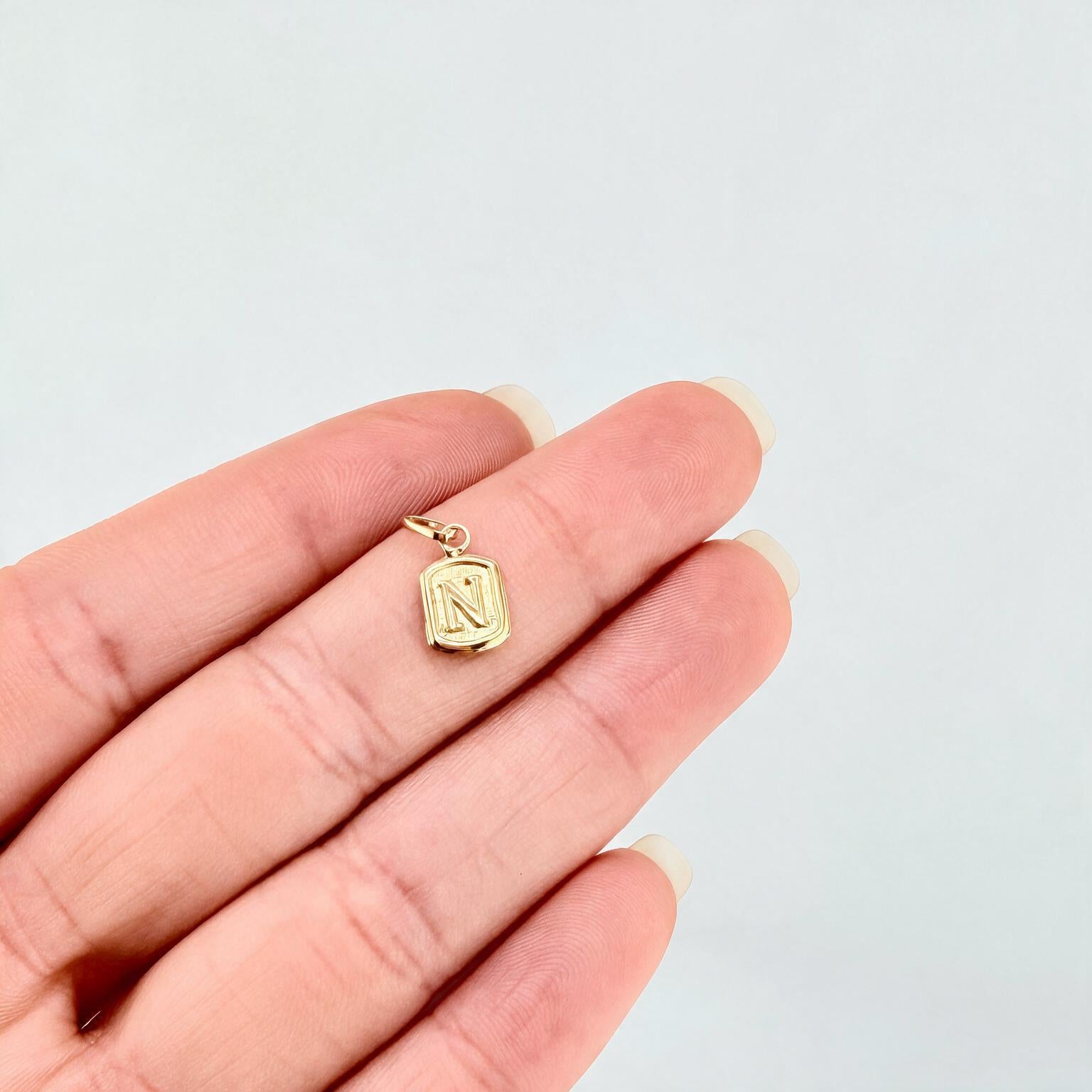 Dije Marco Letra N 0.3 g / 1.5 cm Oro Amarillo 18K