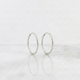 Candongas Aro Liso 0.6gr / 1.4cm / Oro Blanco 18K