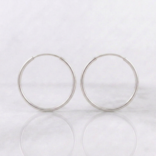 Candongas Aro Liso 0.7gr / 1.6cm / Oro Blanco 18K