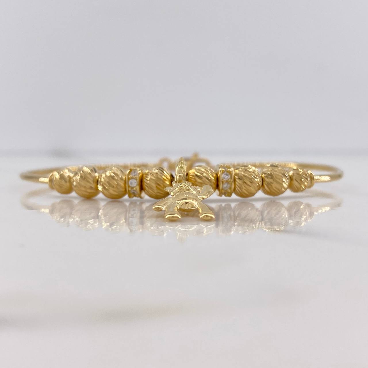 Pulso Aro Oso 7.95gr / 18cm / 5mm-6mm Bolas Diamantadas Circones Blancos Oro Amarillo $