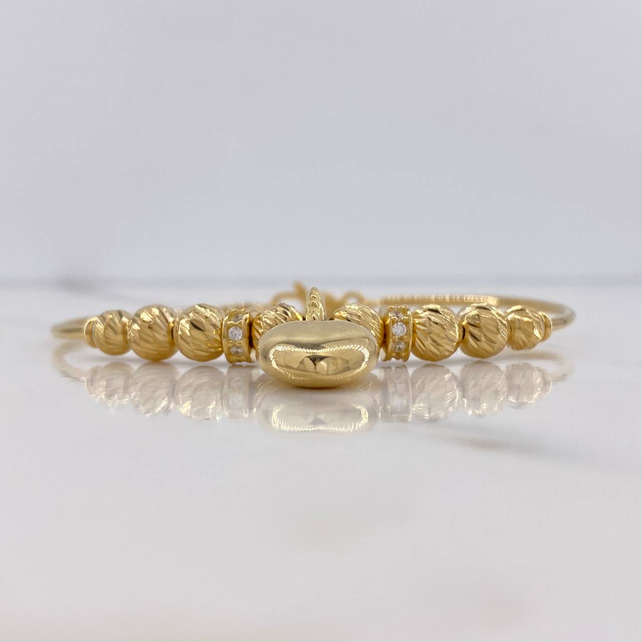 Pulso Aro Corazon 7.9gr / 17cm / 5mm-6mm Bolas Diamantadas Circones Blancos Oro Amarillo $