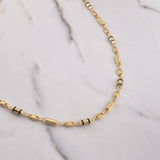 Cadena GC Diamantado 11.65gr / 60cm / 4mm Barril Estriados Cauchos Negros Oro Amarillo $