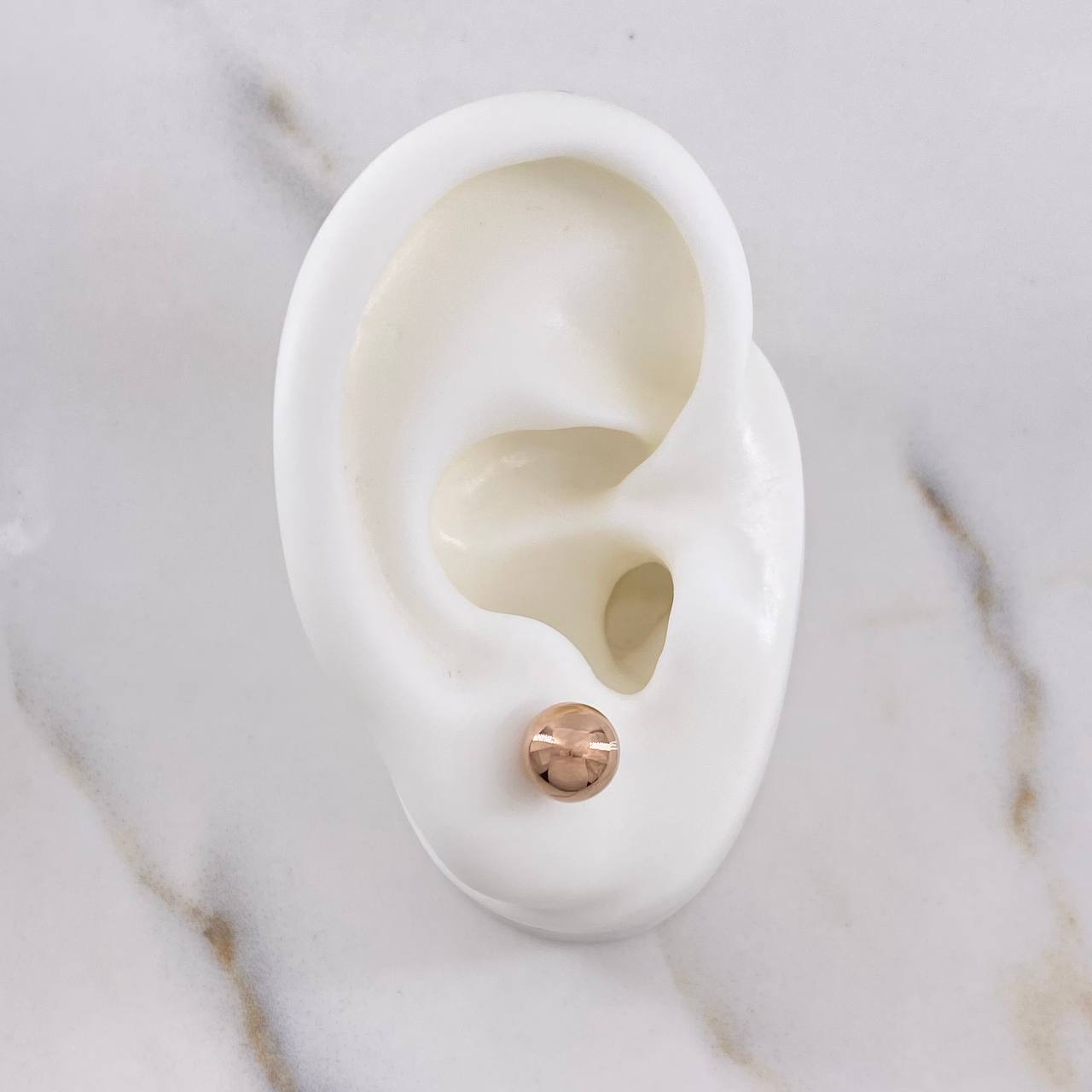 Topos Bola 0.6gr / 7mm Lisa Oro Rosa $