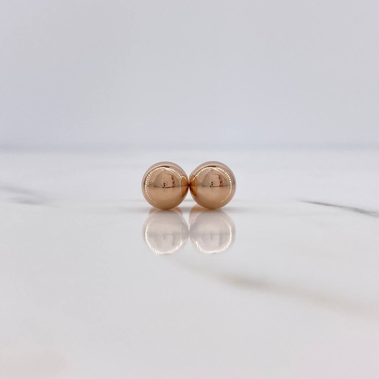 Topos Bola 0.6gr / 7mm Lisa Oro Rosa $