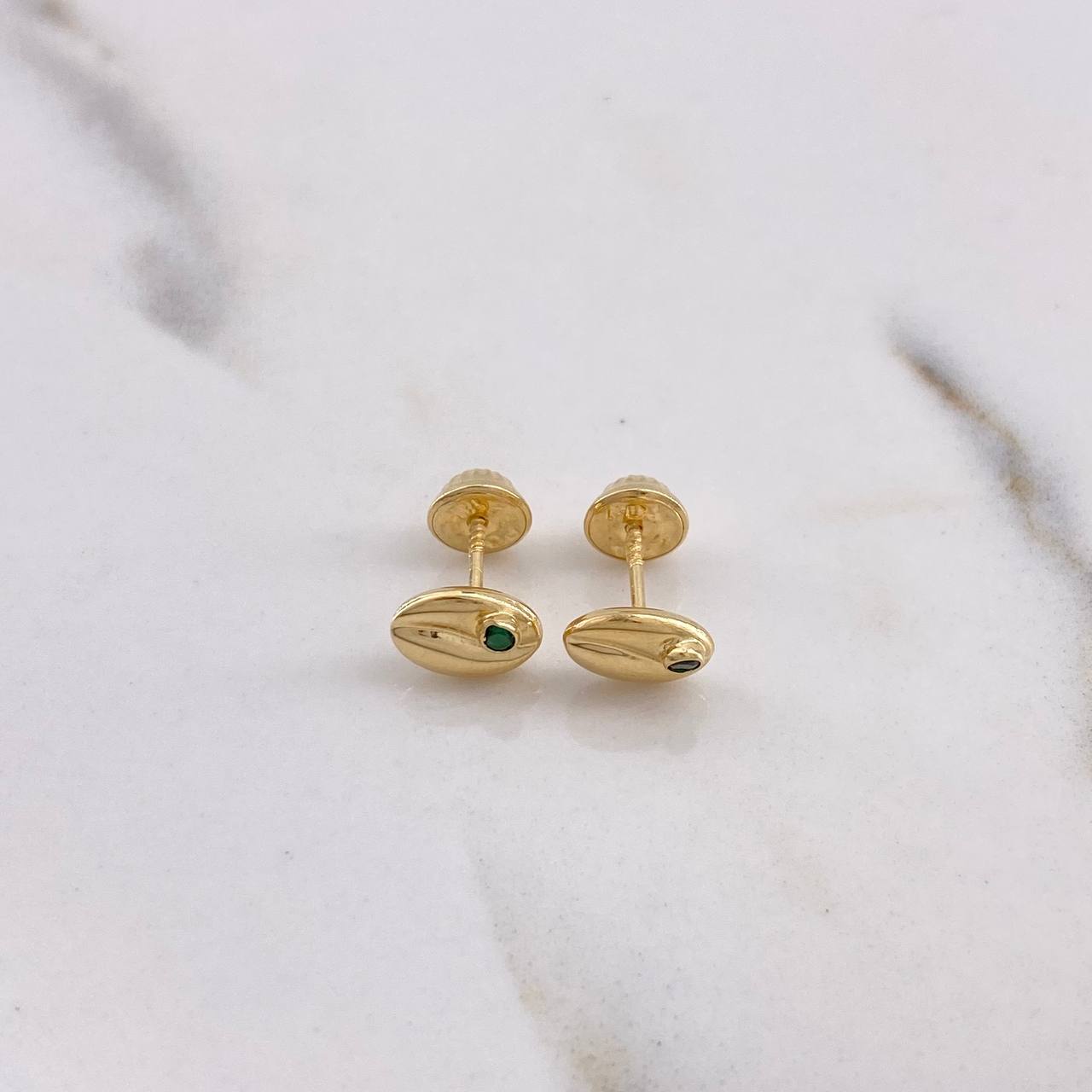 Topos Grano Café 0.6gr / Circon Verde Oro Amarillo $