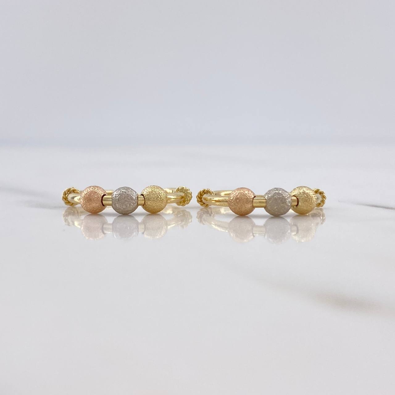 Candongas Mini Aro 1.35gr / 1.7cm / 3mm Bolas Diamantadas Tres Oros $