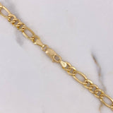 Cadena Figaro 10gr / 60cm / 5.3mm Oro Amarillo +1 18K $