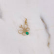 Dije Mariposa 0.6gr / 1.9cm / Esmeralda 12pts Oro Amarillo 18K (Joya) $