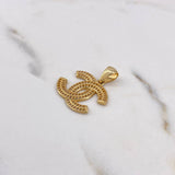 Dije CC 3.35gr / 2.6cm / Circones Blancos Oro Amarillo 18K $