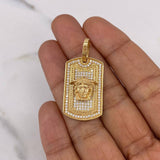 Dije Placa Medusa 7.65gr / 3.8cm / Circones Blancos Oro Amarillo 18K $
