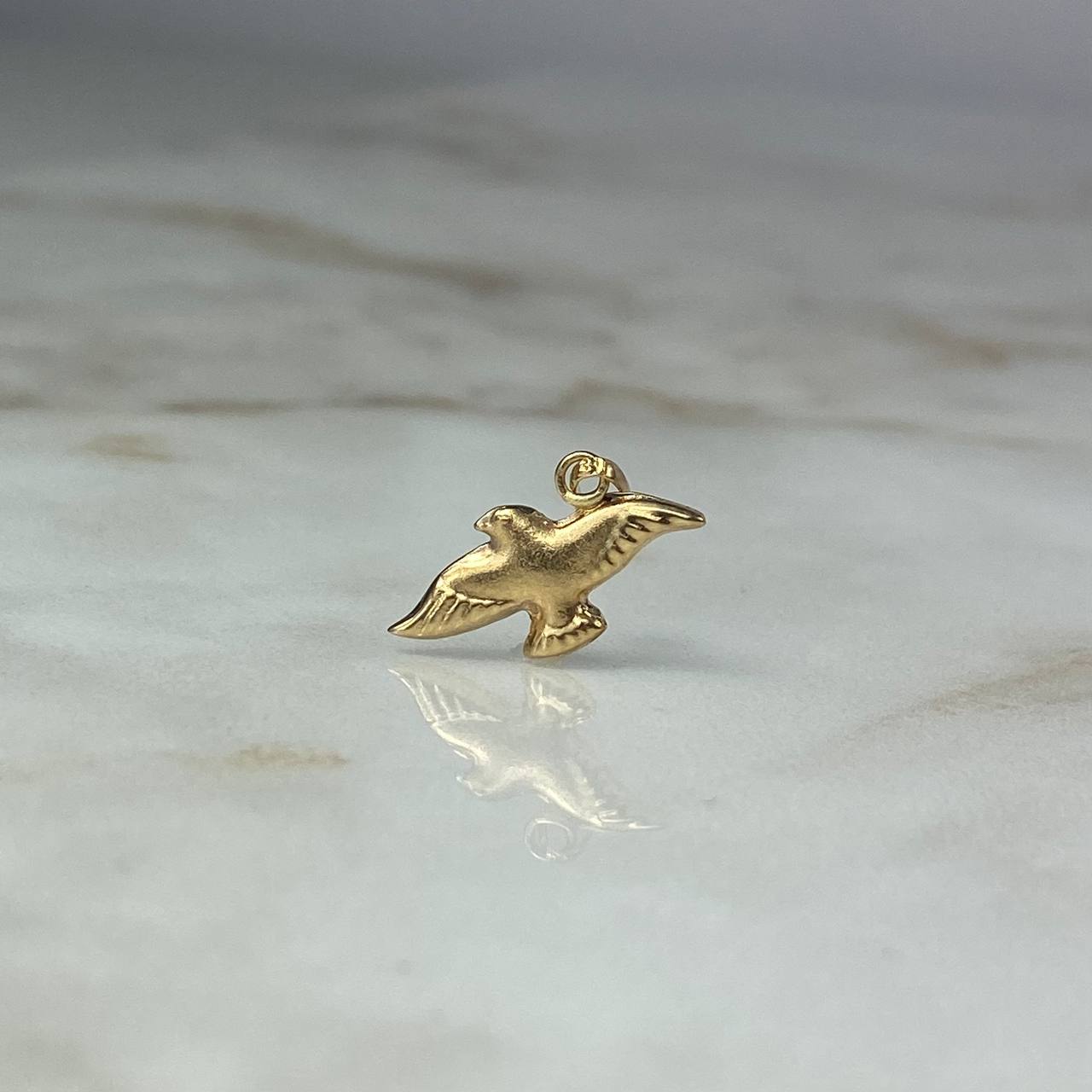 Dije Paloma 0.45gr / 1.3cm / Mate Oro Amarillo $