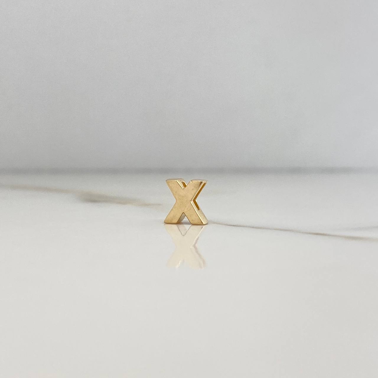 Dije Letra X 0.65gr / 0.7cm / 3D Lisa Oro Amarillo $