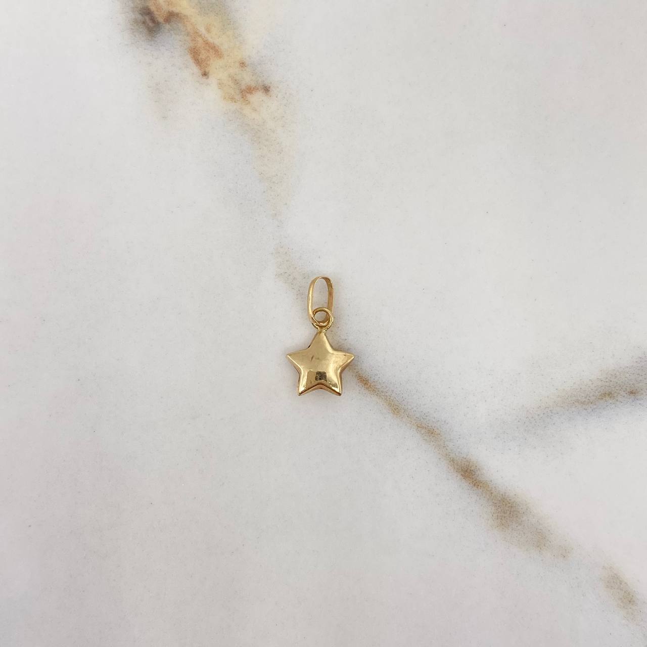 Dije Estrella Mini 0.25gr / 1.4cm / Soplado Oro Amarillo