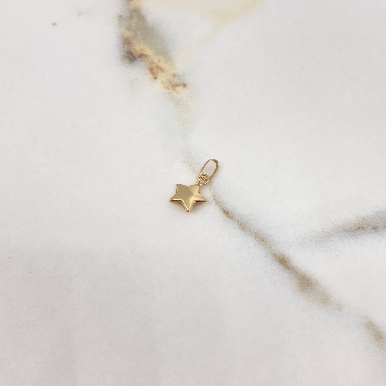 Dije Estrella Mini 0.25gr / 1.4cm / Soplado Oro Amarillo