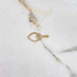 Dije Silueta Corazón 1.25gr / 2.8cm / Corona Circones Blancos Oro Amarillo $