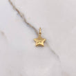 Dije Estrella 0.9gr / 2.2cm / Soplado Oro Amarillo $