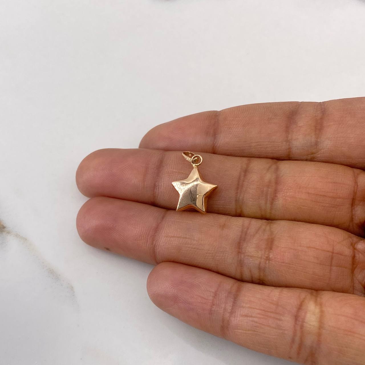 Dije Estrella 0.55gr / 1.9cm / Soplado Oro Rosa $