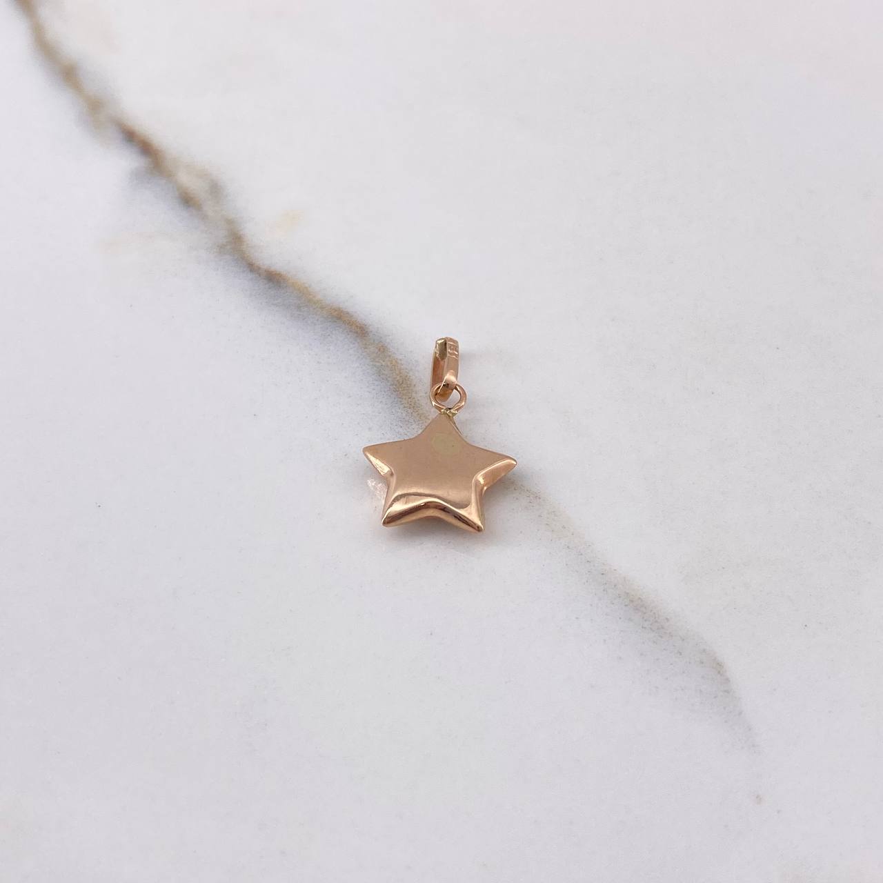 Dije Estrella 0.55gr / 1.9cm / Soplado Oro Rosa $